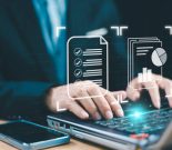 Document management system services concept. Business database electronic document, online data storage network. Businessman working on a laptop with document management icon, Online file technology